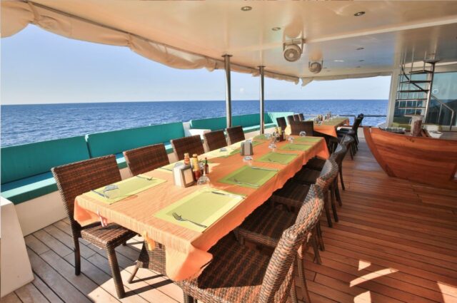 Restaurant_seating_lg Outdoor dining area aboard the Carpe Novo liveaboard